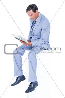 Focused businessman reading a document