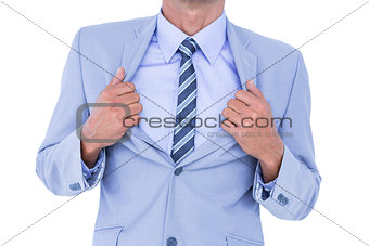 businessman holding his jacket
