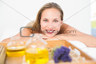 Beautiful blonde lying on massage table
