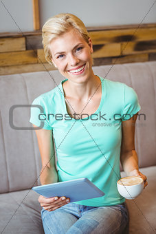 Pretty blonde using laptop computer