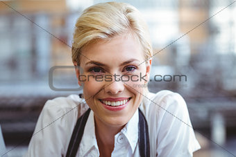 Selfassured female waitress smiling