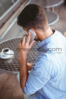Attentive businessman on the phone