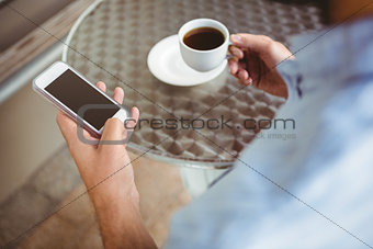 Close up view of businessman texting