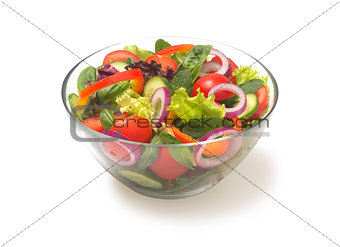 mixed vegetable salad with tomato pepper onion cucumber on a white background