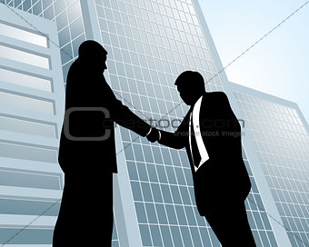Two businessmen at city background