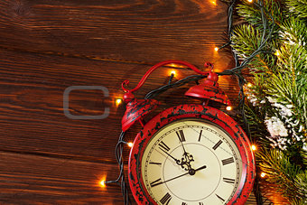 Christmas alarm clock, tree branch and lights