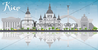 Kiev skyline with grey landmarks, blue sky and reflections