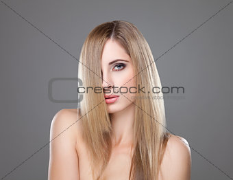 Young blonde beauty with straight hair