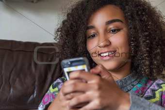 Mixed Race African American Girl Teenager Texting Cell Phone