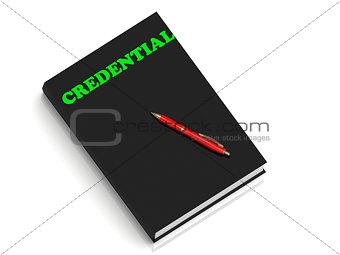 CREDENTIAL- inscription of green letters on black book 