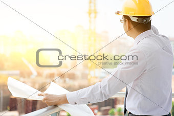 Asian Indian male site contractor engineer working