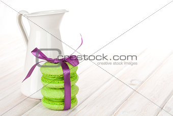 Green macarons with purple ribbon