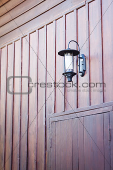 Lamp decorated on wooden wall