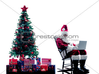 santa claus laptop computer  silhouette isolated