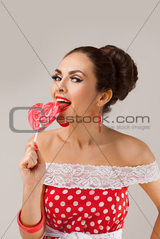 Happy Woman Lick Red Lollipop. Pin-up retro style.