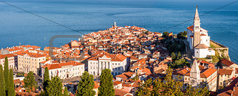 Sunlit Old Town of Piran in the Morning.