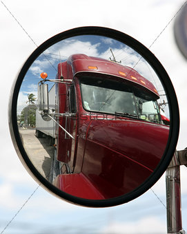 Truck reflected in mirror