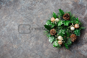 Green Christmas wreath Grey Stone background