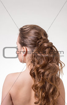 Beautiful long wavy hair. Back view