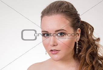 Young brunette lady with a beautiful hair