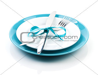Fork with knife over blank plates
