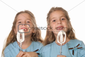 shot of children begging to lick beaters