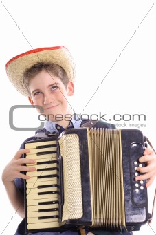 shot of a happy young boy playing an accordian vertical