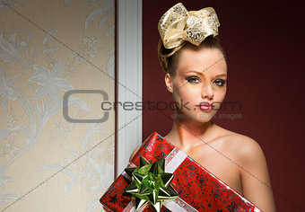 girl with creative xmas style and gift 
