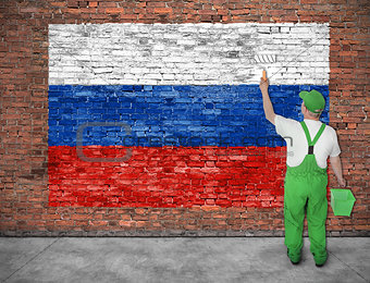 House painter paints flag of Russia 