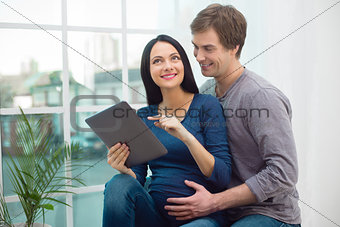 Young beautiful couple at home