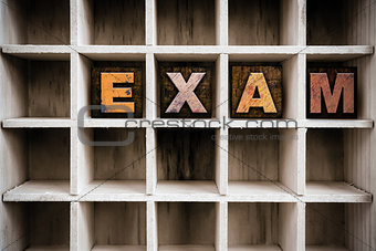 Exam Concept Wooden Letterpress Type in Draw