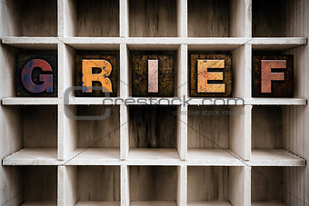 Grief Concept Wooden Letterpress Type in Draw