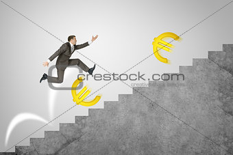 Man running up stairs with gold euro signs