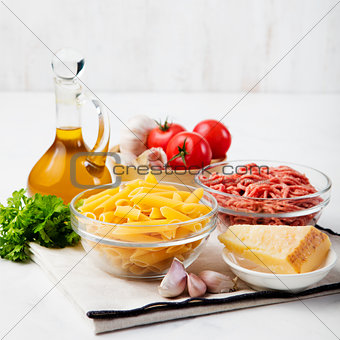 Italian food ingredients: pasta, tomatoes, minced