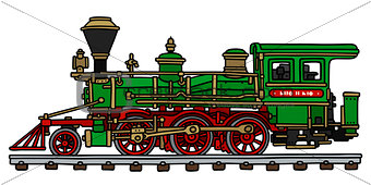 Old green american steam locomotive