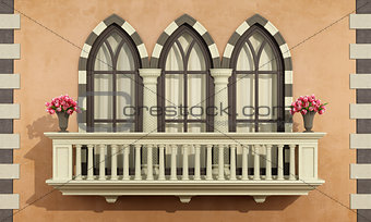 Old facade with classic balcony balustrade