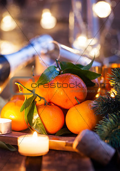Fresh tangerines on holiday background