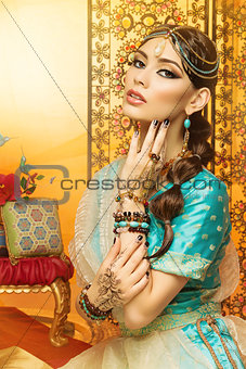 Beautiful girl in oriental costume