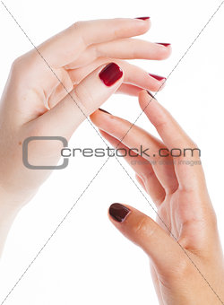two different nathion manicured hands on white isolated, african with caucasian close up