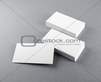 Blank business cards on gray 