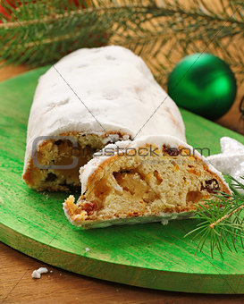 traditional Christmas dessert Stollen with raisins and marzipan