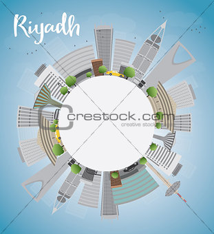 Riyadh skyline with grey buildings and blue sky