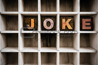 Joke Concept Wooden Letterpress Type in Draw