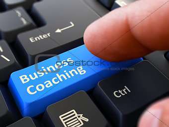 Press Button Business Coaching on Black Keyboard.