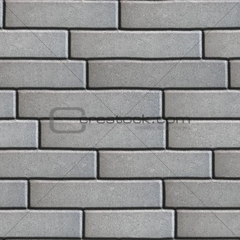 Gray Pavement in the form of Brickwork.
