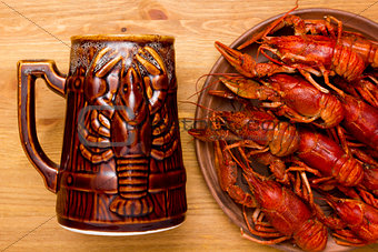 Crayfish with a mug of beer