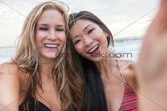 Young Women Girls Taking Selfie Photograph on Beach