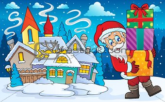 Santa Claus with gifts in winter scenery