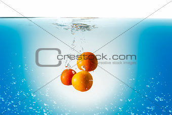 tomatoes in water