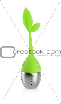 Tea infuser with green leaves